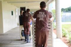 Central County Jail inmates pushing carts